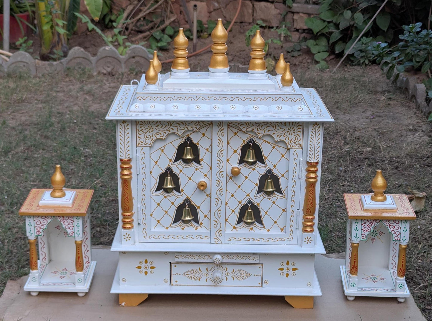 White & Gold Wooden Temple with Bells.