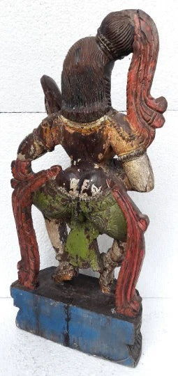 Decorative statue of a figure on a horse with a white background
