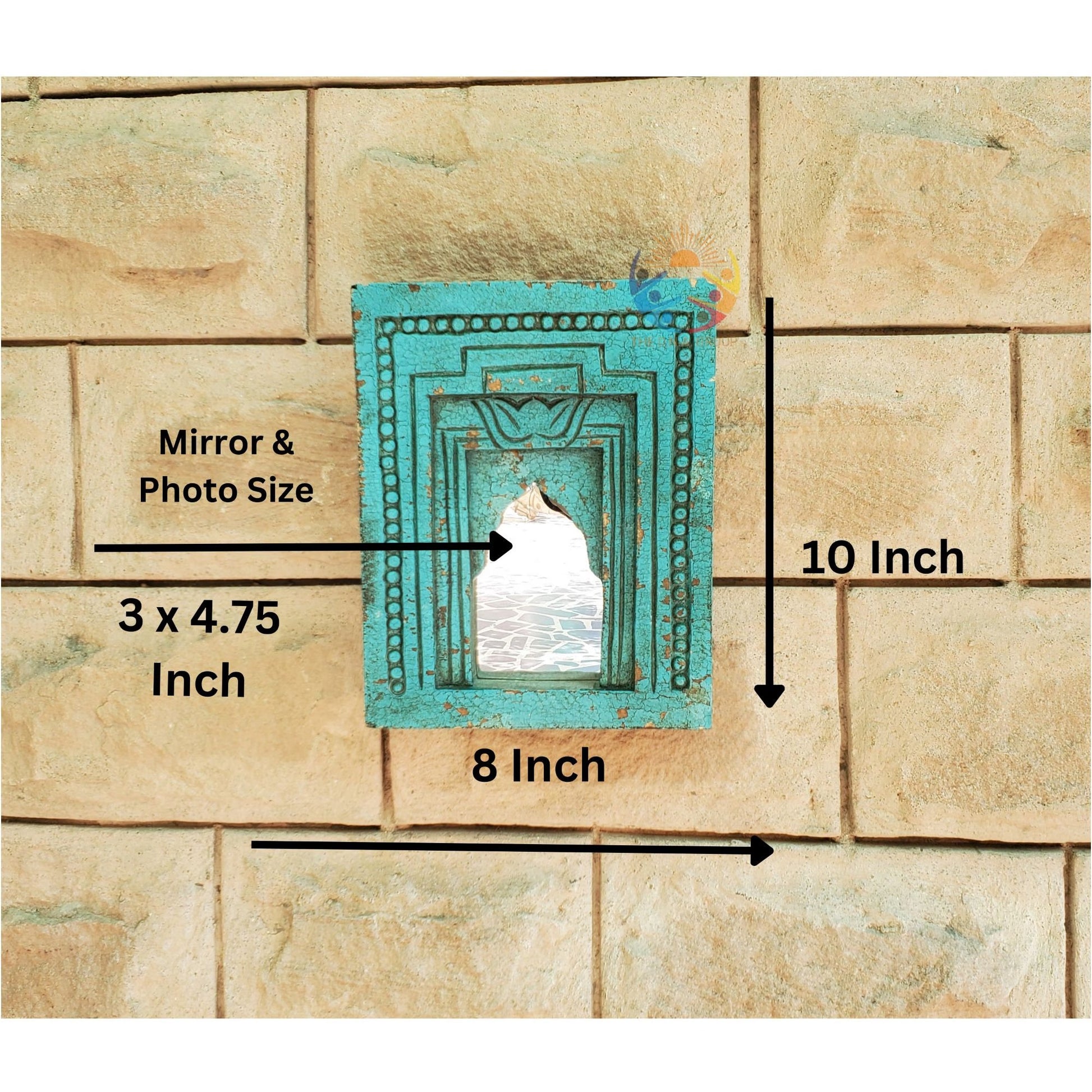 Teal decorative mirror with dimensions labeled on a stone wall background